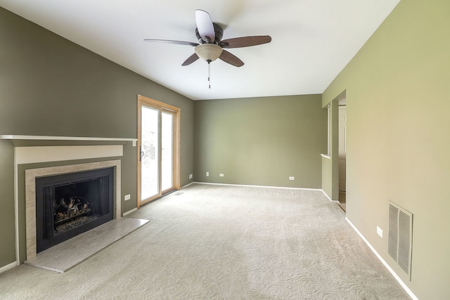 736 73rd St Unit 0, Downers Grove, IL 60516 - unfurnished living room with ceiling fan, a fireplace, and carpet flooring