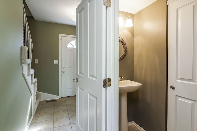 736 73rd St Unit 0, Downers Grove, IL 60516 - bathroom featuring tile patterned floors and a sink