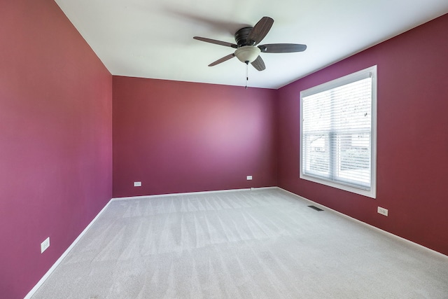 736 73rd St Unit 0, Downers Grove, IL 60516 - unfurnished room featuring a ceiling fan and carpet floors