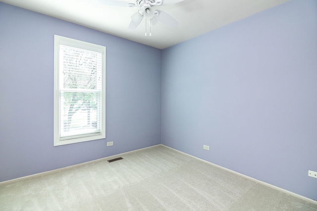 736 73rd St Unit 0, Downers Grove, IL 60516 - spare room featuring carpet floors and ceiling fan