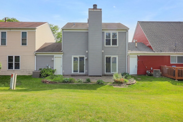 736 73rd St Unit 0, Downers Grove, IL 60516 - back of house featuring a lawn, a chimney, and a shingled roof