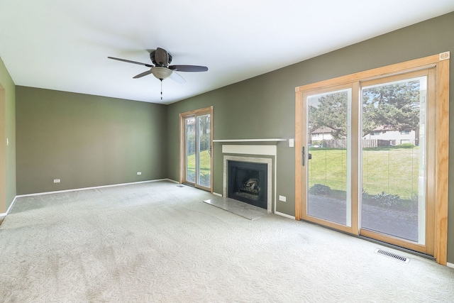 736 73rd St Unit 0, Downers Grove, IL 60516 - unfurnished living room featuring carpet, a ceiling fan, and a fireplace