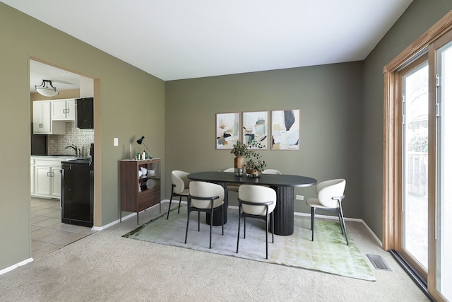 736 73rd St Unit 0, Downers Grove, IL 60516 - dining area with light carpet and healthy amount of natural light