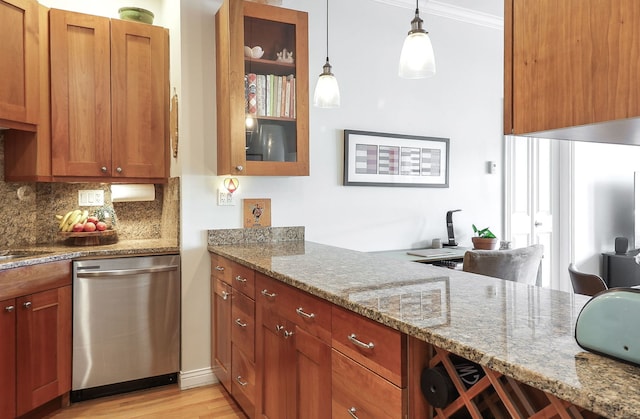 1355 W Washington Blvd Unit 4A, Chicago, IL 60607 - kitchen featuring stainless steel dishwasher, tasteful backsplash, light wood-style floors, brown cabinetry, and light stone countertops