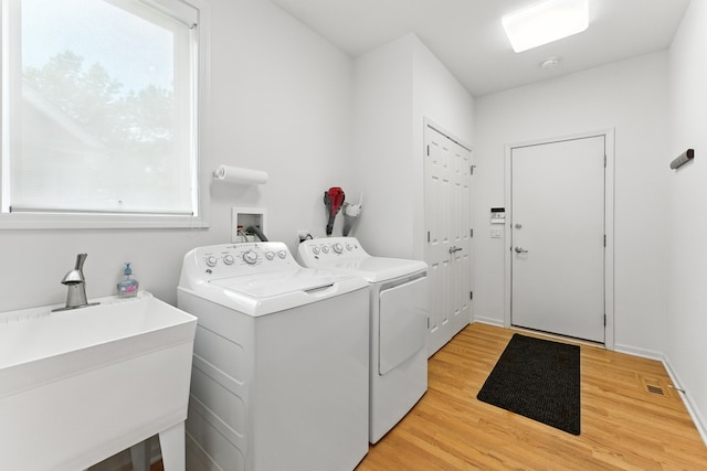 2471 Augusta Way, Highland Park, IL 60035 - laundry room with washing machine and dryer and light wood finished floors