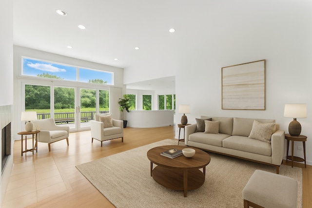 2471 Augusta Way, Highland Park, IL 60035 - living area featuring a glass covered fireplace, recessed lighting, and light wood-style floors