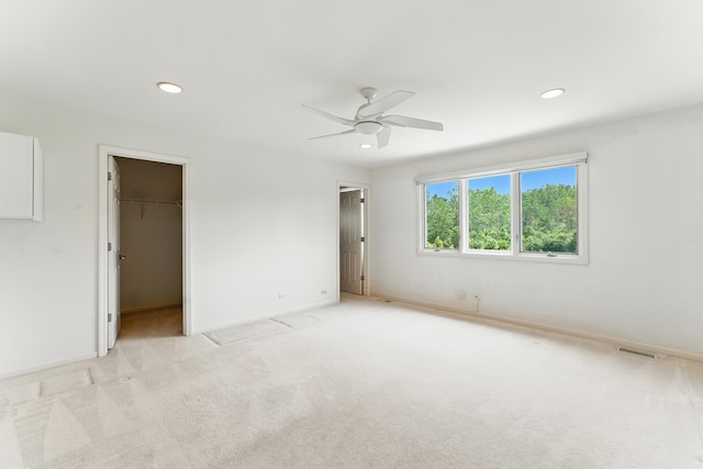 2471 Augusta Way, Highland Park, IL 60035 - unfurnished bedroom featuring recessed lighting, light carpet, a ceiling fan, and a spacious closet