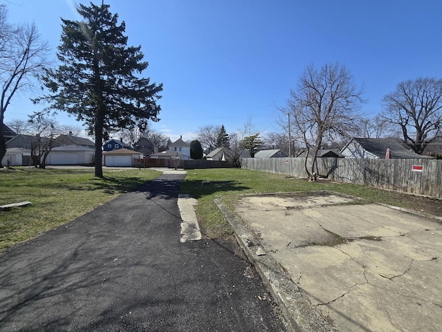 920 S Mcalister Ave, Waukegan, IL 60085 - view of asphalt driveway with a residential view