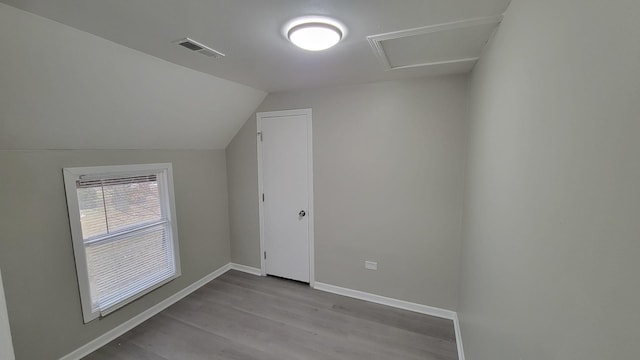 920 S Mcalister Ave, Waukegan, IL 60085 - bonus room featuring wood finished floors and vaulted ceiling