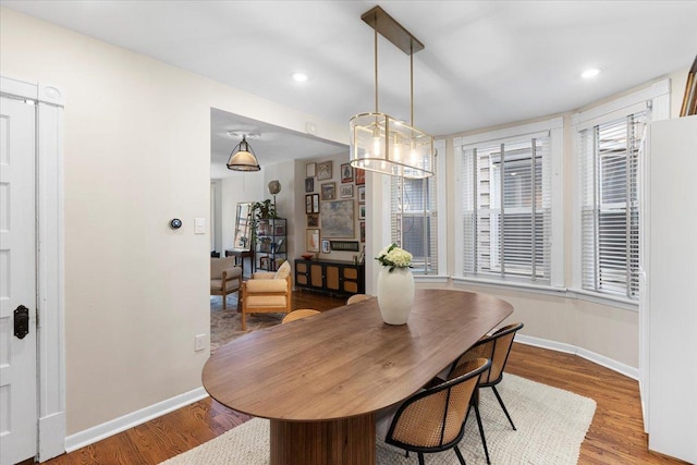 3828 N Wilton Ave, Chicago, IL 60613 - dining area featuring baseboards, wood finished floors, and recessed lighting