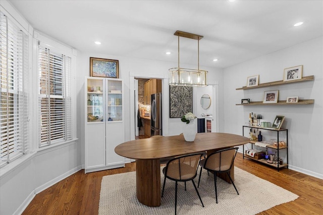 3828 N Wilton Ave, Chicago, IL 60613 - dining room with baseboards, wood finished floors, and recessed lighting