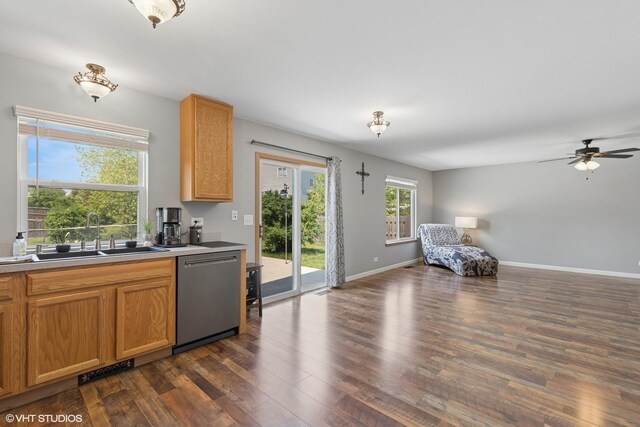 261 E Camden Ln, Round Lake Beach, IL 60073 - kitchen featuring dishwasher, a sink, dark wood-style flooring, open floor plan, and a ceiling fan