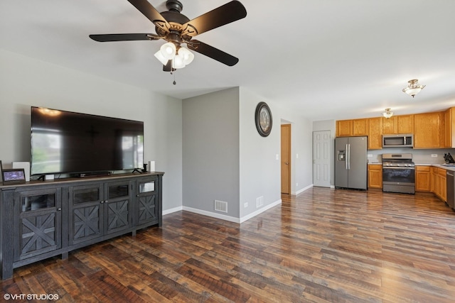 261 E Camden Ln, Round Lake Beach, IL 60073 - living room featuring dark wood finished floors, baseboards, and ceiling fan