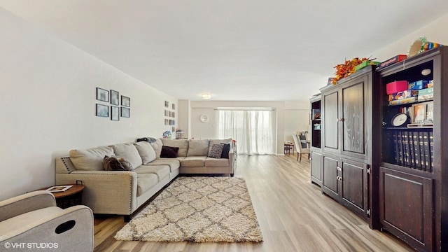 6833 N Kedzie Ave Unit 716, Chicago, IL 60645 - living area with light wood-style floors