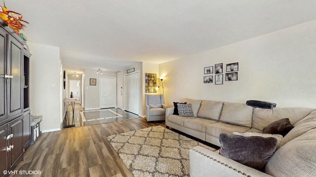 6833 N Kedzie Ave Unit 716, Chicago, IL 60645 - living room with dark wood-style floors and baseboards