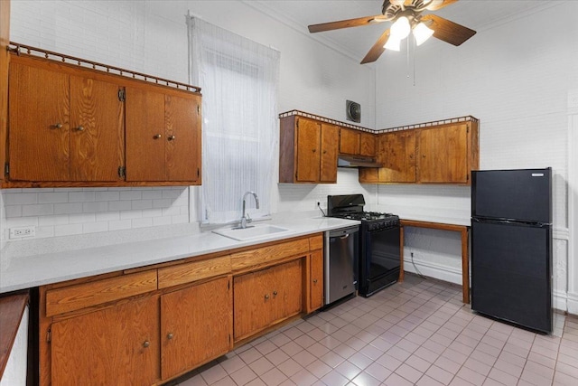 3357 S Oakley Ave, Chicago, IL 60608 - kitchen featuring black appliances, a sink, under cabinet range hood, brown cabinets, and light countertops