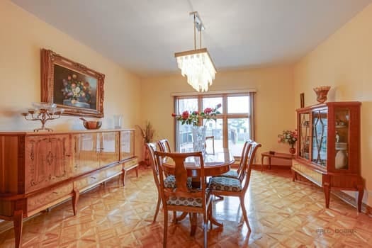 dining room featuring a chandelier