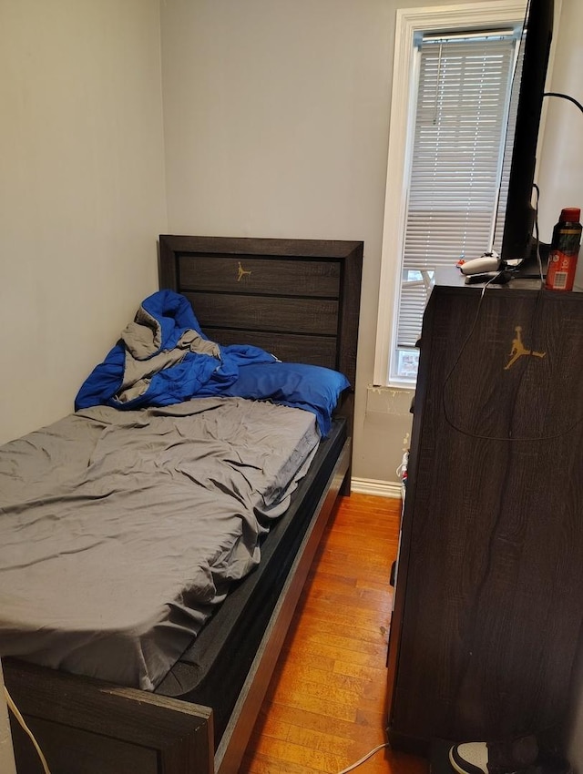 2240 W 50th Pl, Chicago, IL 60609 - bedroom with light wood-style flooring and baseboards
