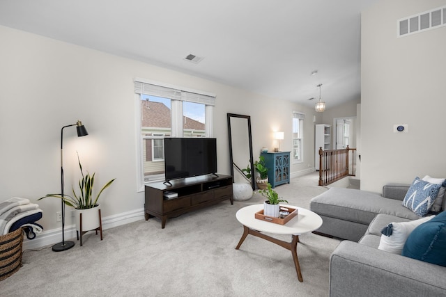 1795 Vermont Dr Unit A, Elk Grove Village, IL 60007 - living room with light colored carpet and vaulted ceiling