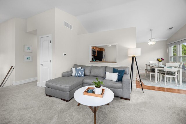 1795 Vermont Dr Unit A, Elk Grove Village, IL 60007 - living room with lofted ceiling, carpet flooring, and a ceiling fan