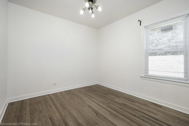4024 N Overhill Ave, Norridge, IL 60706 - unfurnished room featuring dark wood finished floors and baseboards