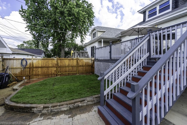 4024 N Overhill Ave, Norridge, IL 60706 - fenced backyard with stairway, a deck, and a patio area
