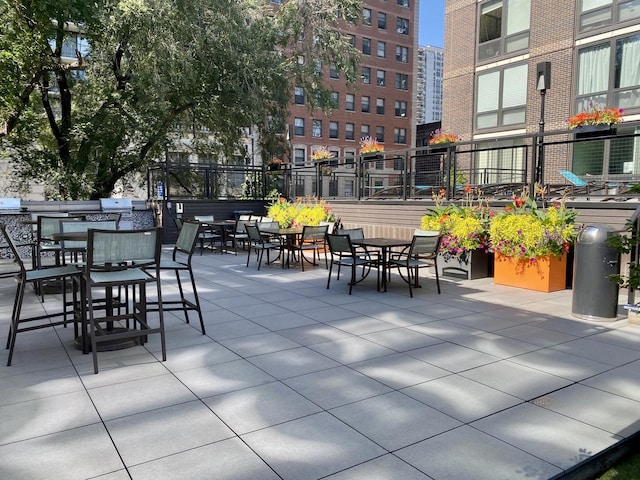 21 W Goethe St Unit 18D, Chicago, IL 60610 - view of patio featuring outdoor dining space and grilling area