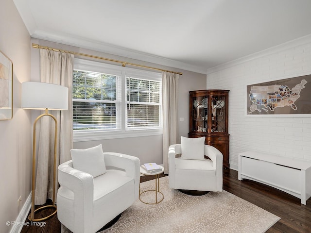 195 N Park Blvd, Glen Ellyn, IL 60137 - sitting room featuring ornamental molding, brick wall, and dark wood-style flooring