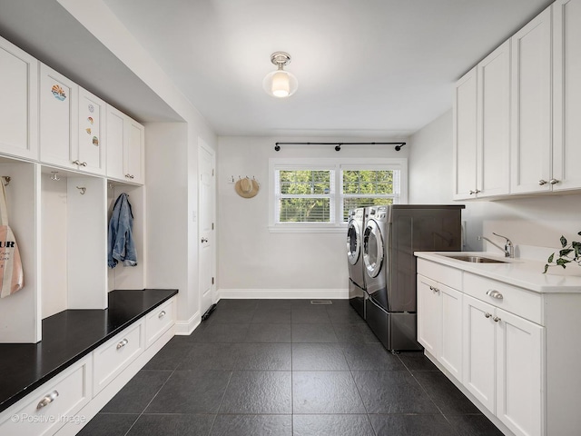 195 N Park Blvd, Glen Ellyn, IL 60137 - washroom with separate washer and dryer, cabinet space, and dark tile patterned floors