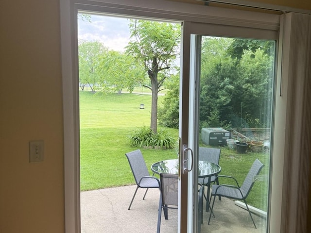 1742 Victor Ter, Gurnee, IL 60031 - doorway to outside with carpet floors and plenty of natural light