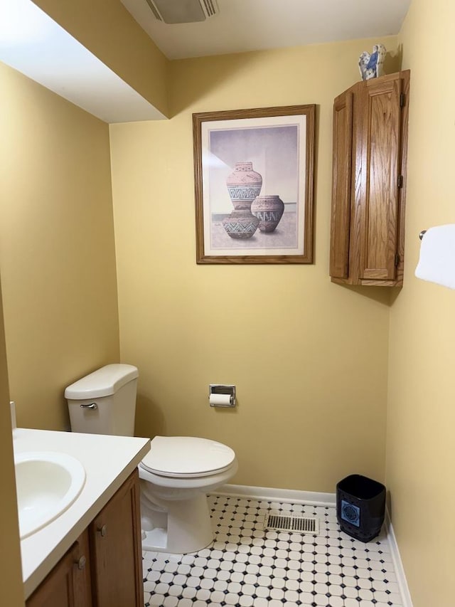 1742 Victor Ter, Gurnee, IL 60031 - bathroom featuring toilet, baseboards, and vanity