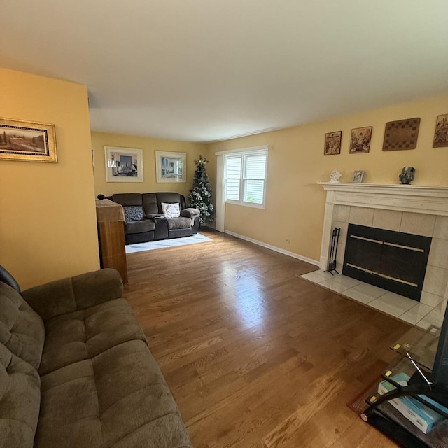 1742 Victor Ter, Gurnee, IL 60031 - living room with a fireplace, wood finished floors, and baseboards