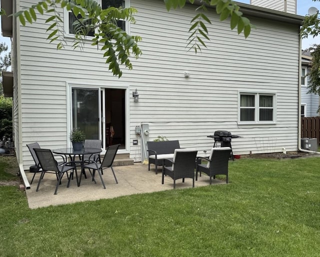 1742 Victor Ter, Gurnee, IL 60031 - back of house featuring cooling unit, a lawn, and a patio area