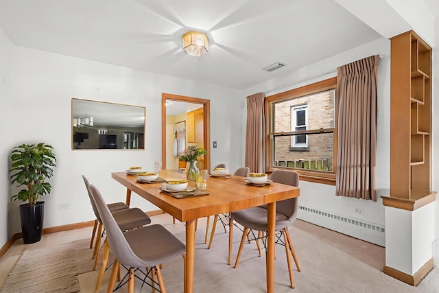 5129 N Normandy Ave, Chicago, IL 60656 - dining area with a baseboard heating unit and baseboards