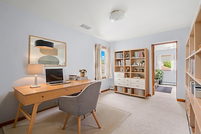 5129 N Normandy Ave, Chicago, IL 60656 - home office with baseboard heating, plenty of natural light, and light colored carpet