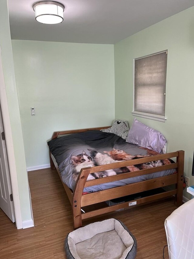 1018 E Oak Ave, La Grange Park, IL 60526 - bedroom with wood finished floors and baseboards