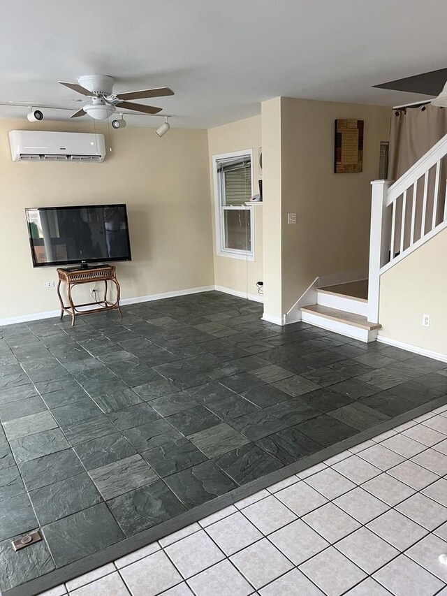 1018 E Oak Ave, La Grange Park, IL 60526 - unfurnished living room featuring a wall mounted air conditioner, ceiling fan, and baseboards