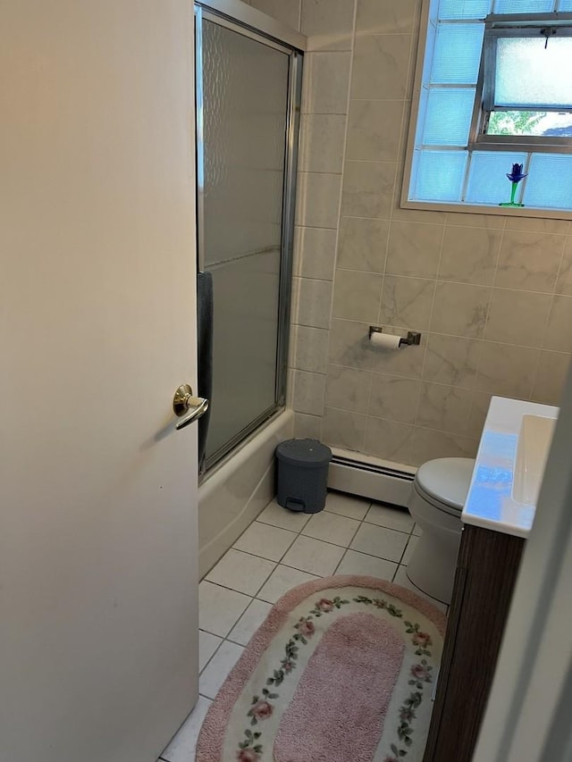 1018 E Oak Ave, La Grange Park, IL 60526 - full bath with a baseboard radiator, tile patterned floors, toilet, vanity, and enclosed tub / shower combo