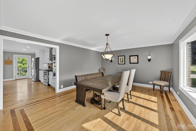 1714 Il Route 173, Spring Grove, IL 60081 - dining area with light wood finished floors, healthy amount of natural light, baseboards, and ornamental molding