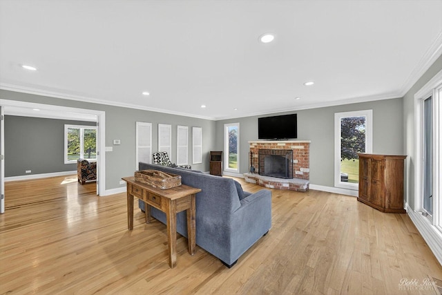 1714 Il Route 173, Spring Grove, IL 60081 - living room featuring light wood-type flooring, a fireplace, ornamental molding, recessed lighting, and baseboards