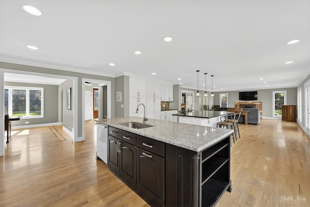 1714 Il Route 173, Spring Grove, IL 60081 - kitchen with a sink, a spacious island, dishwasher, baseboards, and open shelves