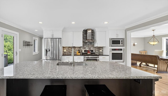 1714 Il Route 173, Spring Grove, IL 60081 - kitchen featuring stainless steel appliances, a sink, wall chimney exhaust hood, white cabinets, and ornamental molding