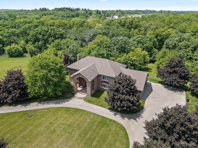 1714 Il Route 173, Spring Grove, IL 60081 - aerial view of property and surrounding area featuring a heavily wooded area