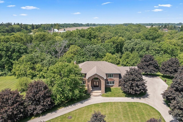 1714 Il Route 173, Spring Grove, IL 60081 - aerial view of property and surrounding area featuring a heavily wooded area