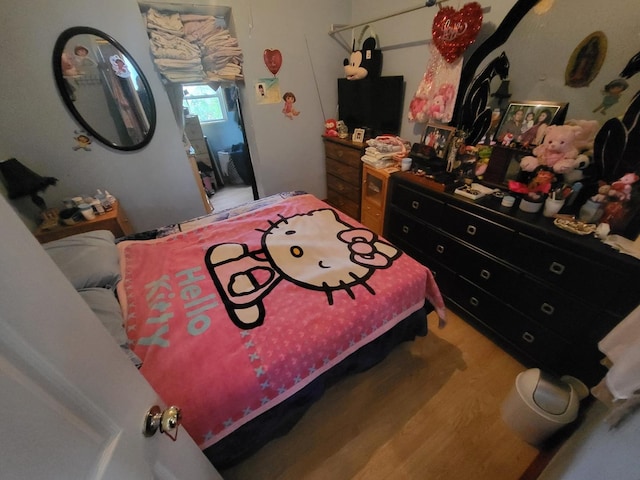 817 N Kolin Ave, Chicago, IL 60651 - bedroom with wood finished floors