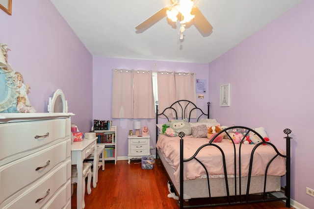 14447 Kolin Ave, Midlothian, IL 60445 - bedroom with dark wood finished floors and ceiling fan