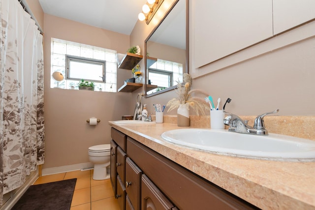 14447 Kolin Ave, Midlothian, IL 60445 - bathroom featuring double vanity and tile patterned flooring