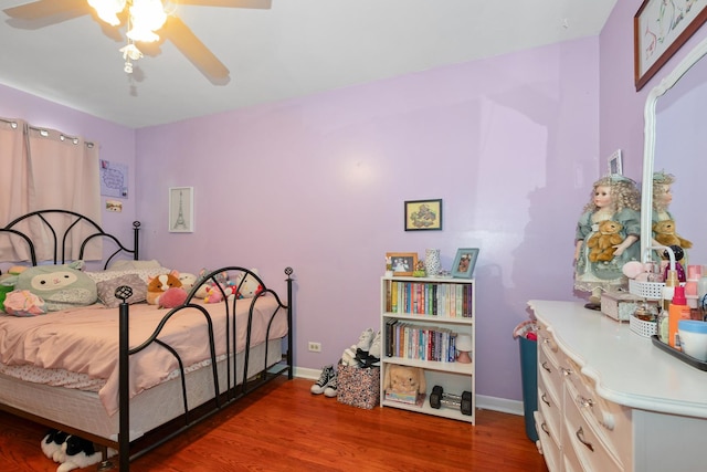 14447 Kolin Ave, Midlothian, IL 60445 - bedroom with wood finished floors and ceiling fan