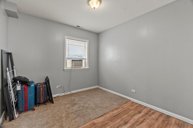 5905 S Indiana Ave, Chicago, IL 60637 - interior space featuring baseboards, wood finished floors, and cooling unit