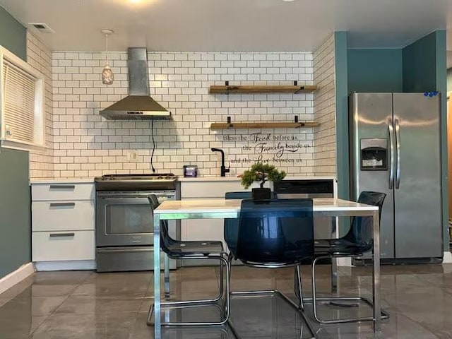 5905 S Indiana Ave, Chicago, IL 60637 - kitchen featuring stainless steel appliances, wall chimney exhaust hood, light countertops, backsplash, and white cabinets